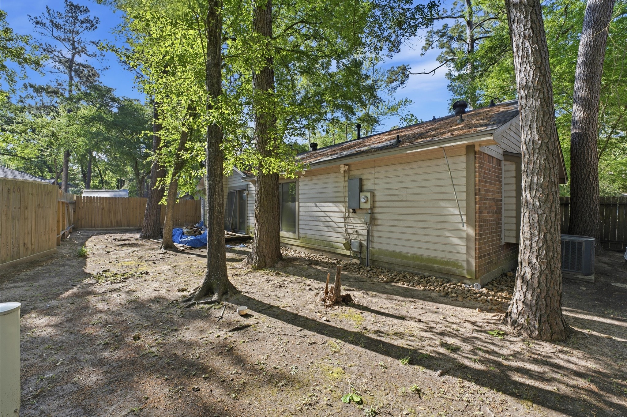 29 South High Oaks Circle Spring, TX 77380 - Photo 18 of 21 a view of a house with a yard and tree