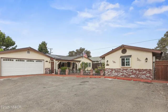a house view with a outdoor space