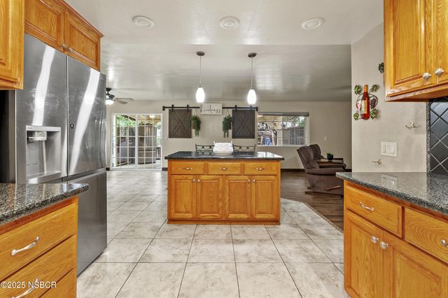 a view of a door and a window