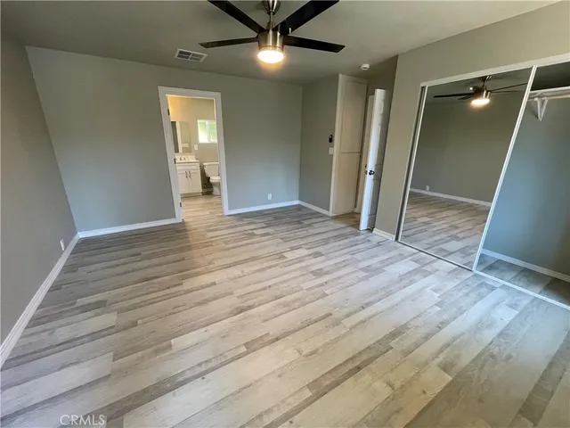 a bathroom with a double vanity sink and mirror