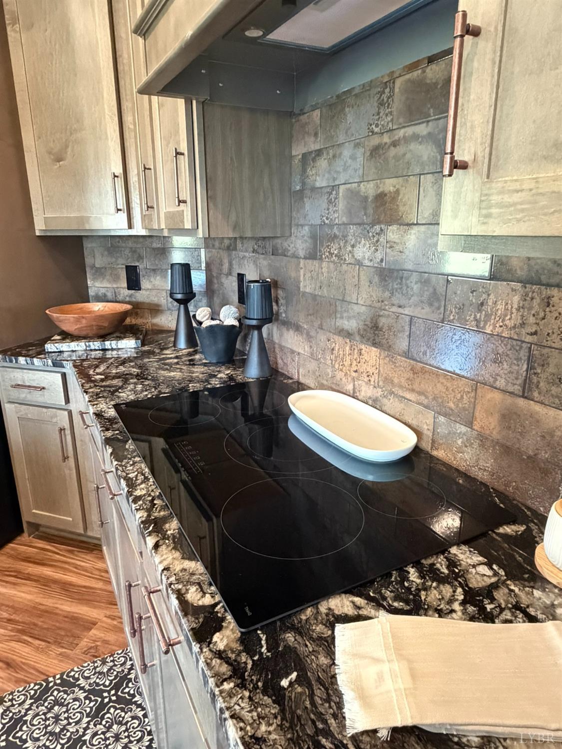 405 Hixburg Road Pamplin, VA 23958 - Photo 19 of 73 a kitchen with a stove a sink and a microwave