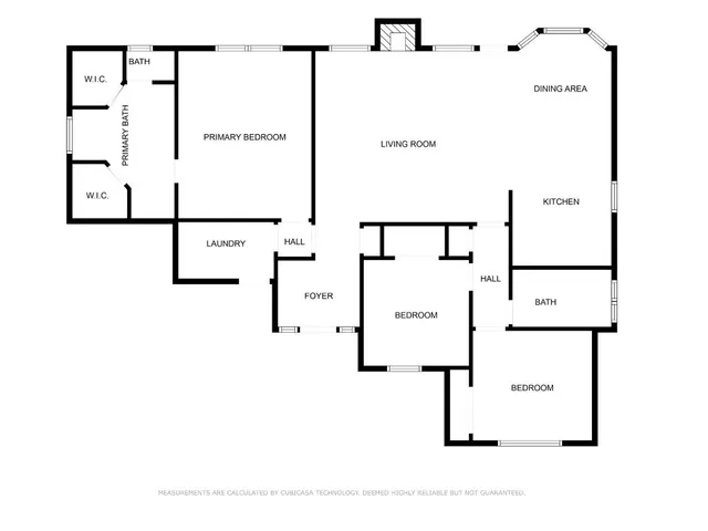 a front view of a house with a empty space