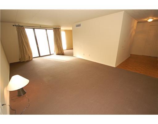 900 Washington Road, Unit 210 Mt. Lebanon, PA 15228 - Photo 6 of 16 Living Room. The large living room leads directly to the outside porch.