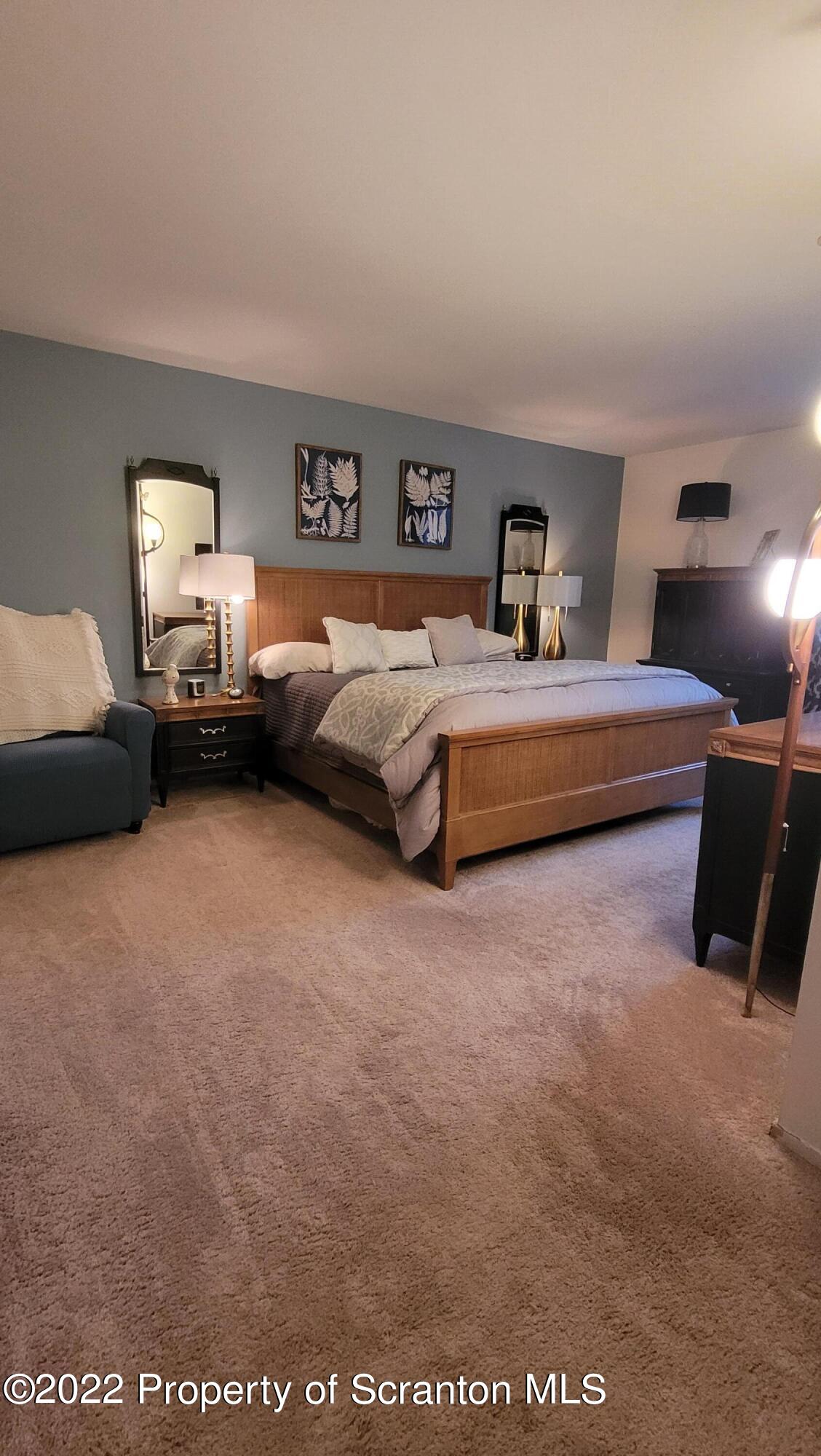 1506 Summit Pointe Scranton, PA 18508 - Photo 19 of 21 a bedroom with a bed and window