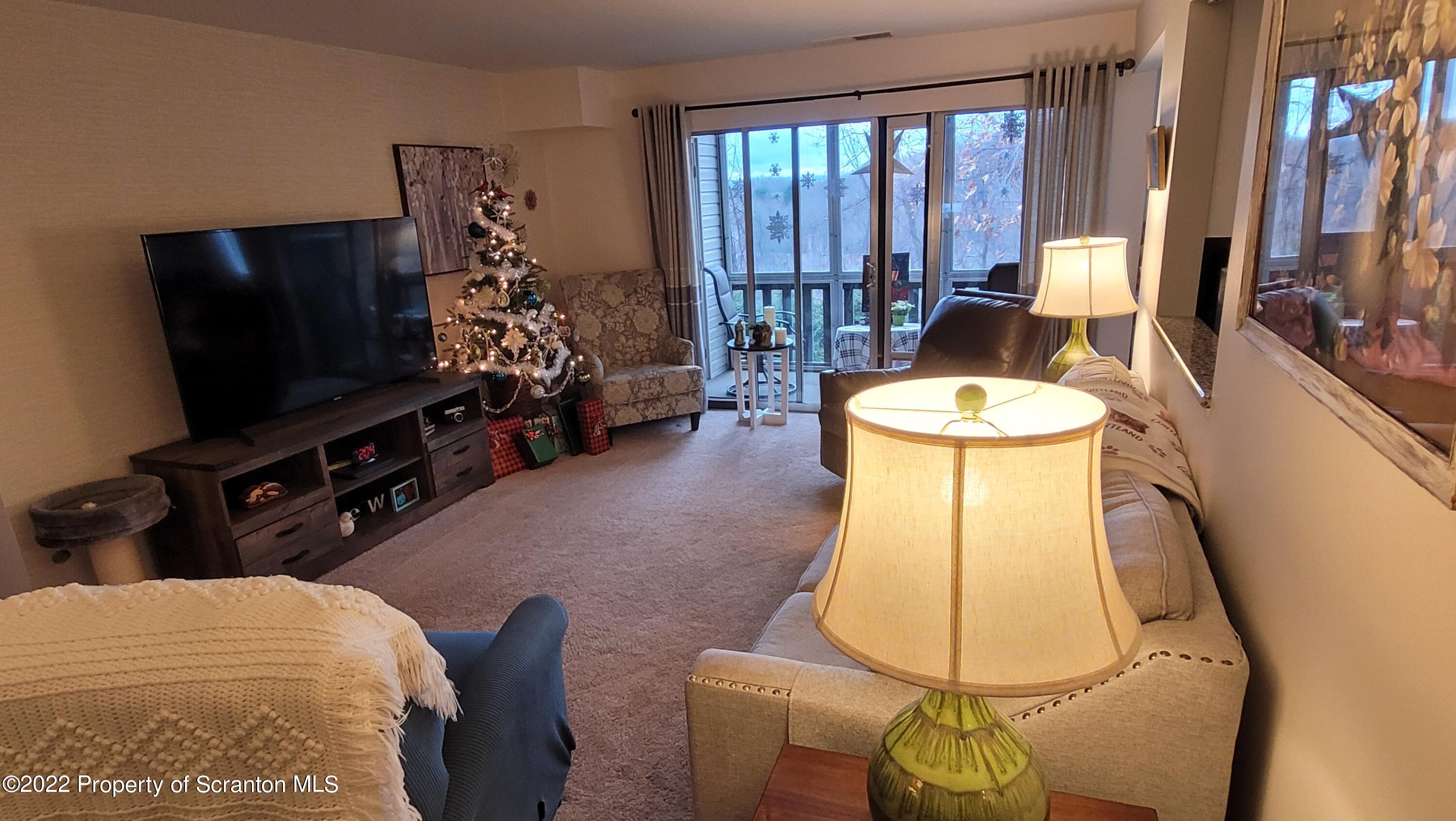 1506 Summit Pointe Scranton, PA 18508 - Photo 6 of 21 a living room with furniture and a flat screen tv