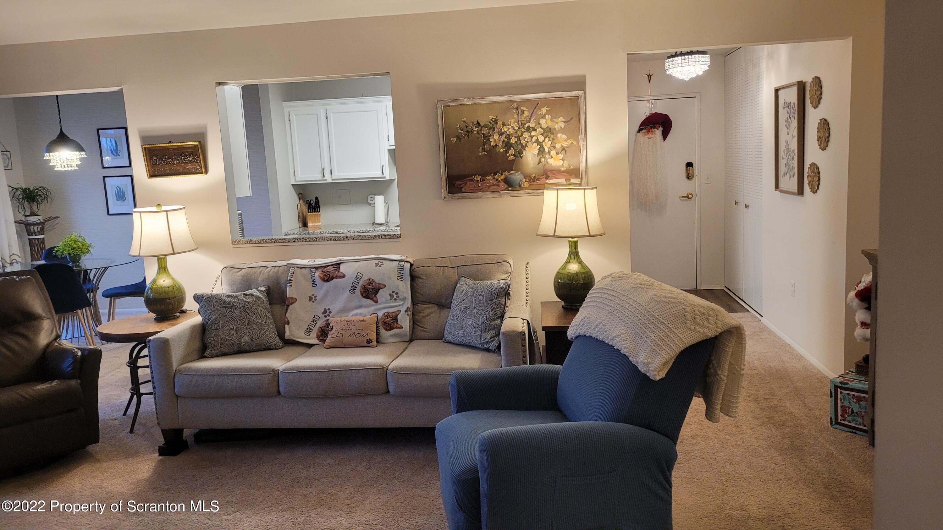 1506 Summit Pointe Scranton, PA 18508 - Photo 7 of 21 a living room with furniture and a potted plant