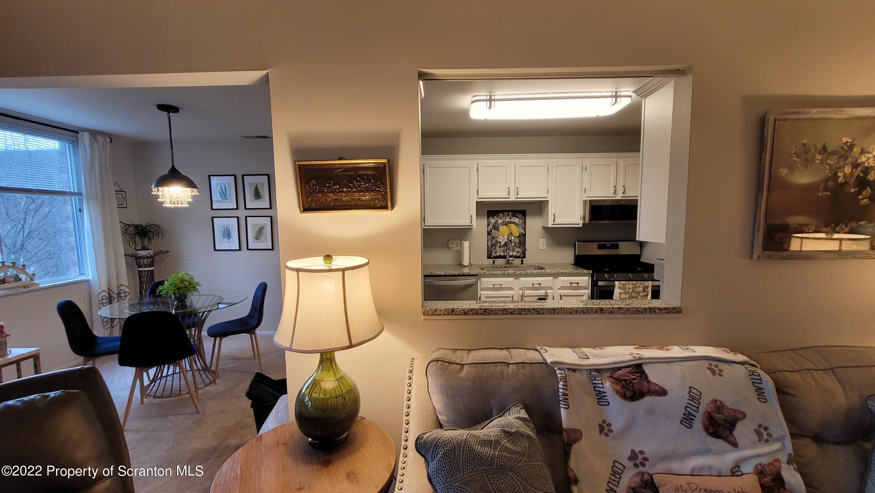 1506 Summit Pointe Scranton, PA 18508 - Photo 9 of 21 a living room with furniture and flat screen tv
