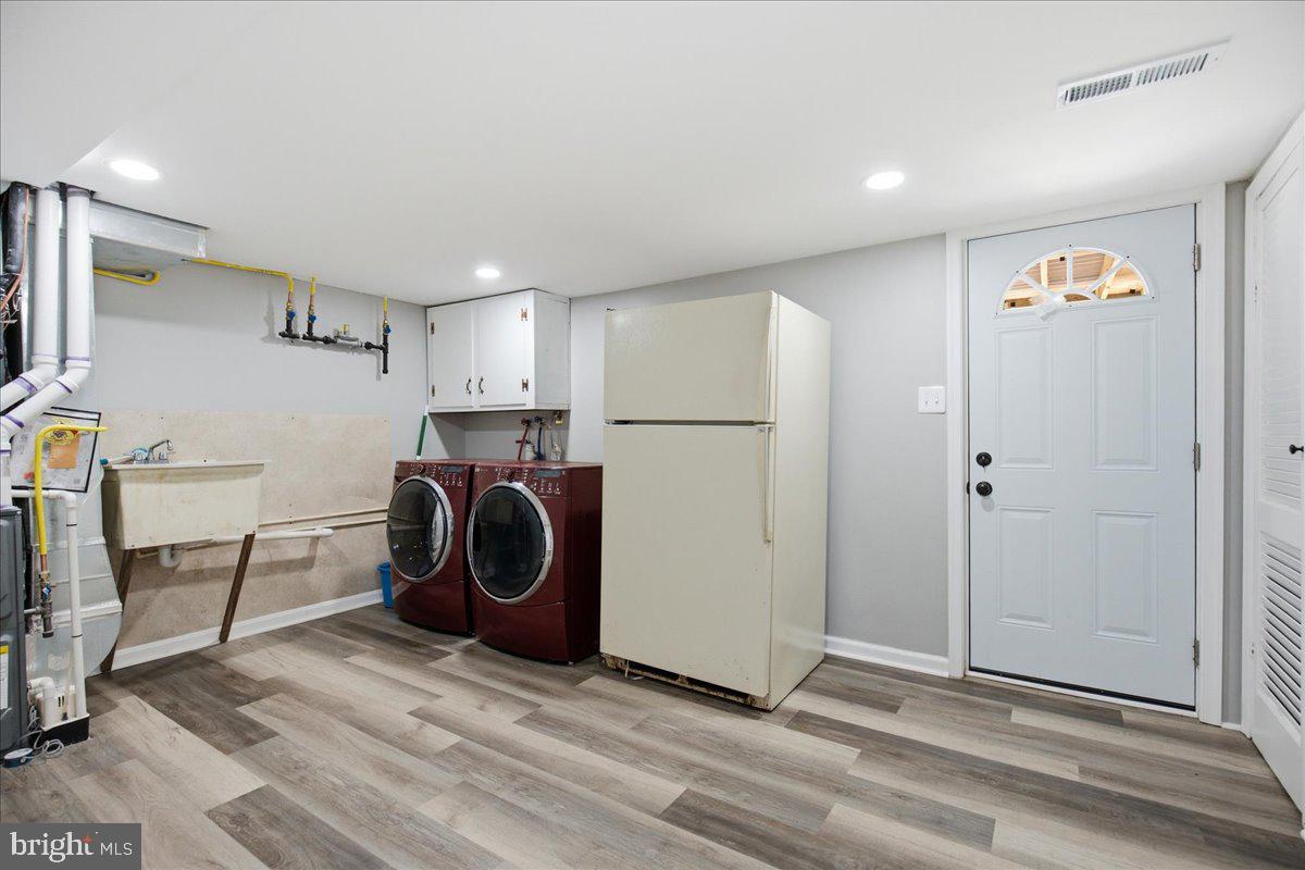 2175 Ponds Wood Road Huntingtown, MD 20639 - Photo 71 of 76 Laundry and mech space w/ extra fridge