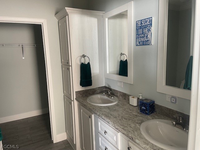 2951 York Road St. James City, FL 33956 - Photo 14 of 17 a bathroom with a granite countertop sink and a mirror