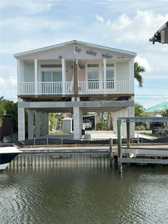 2951 York Road St. James City, FL 33956 - Photo 16 of 17 a view of a swimming pool with outdoor seating