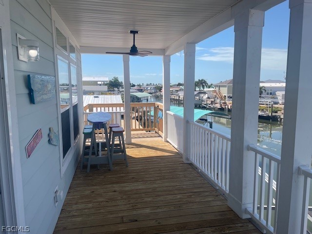 2951 York Road St. James City, FL 33956 - Photo 4 of 17 a view of a dining room with furniture window and wooden floor