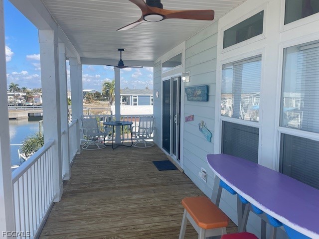 2951 York Road St. James City, FL 33956 - Photo 5 of 17 a view of a room with furniture and wooden floor