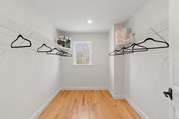 a view of a room with racks on the wall