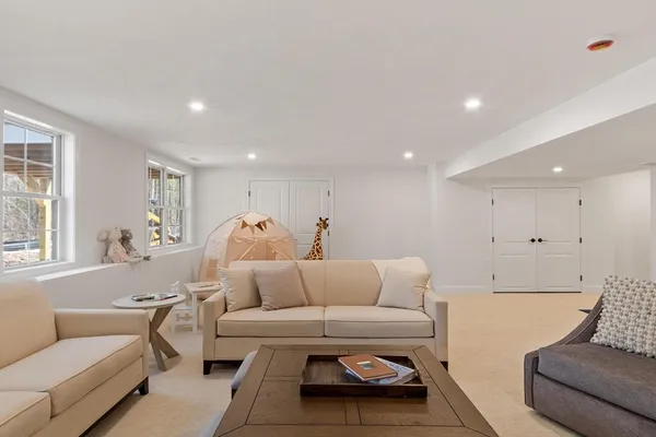 a living room with furniture and a couch