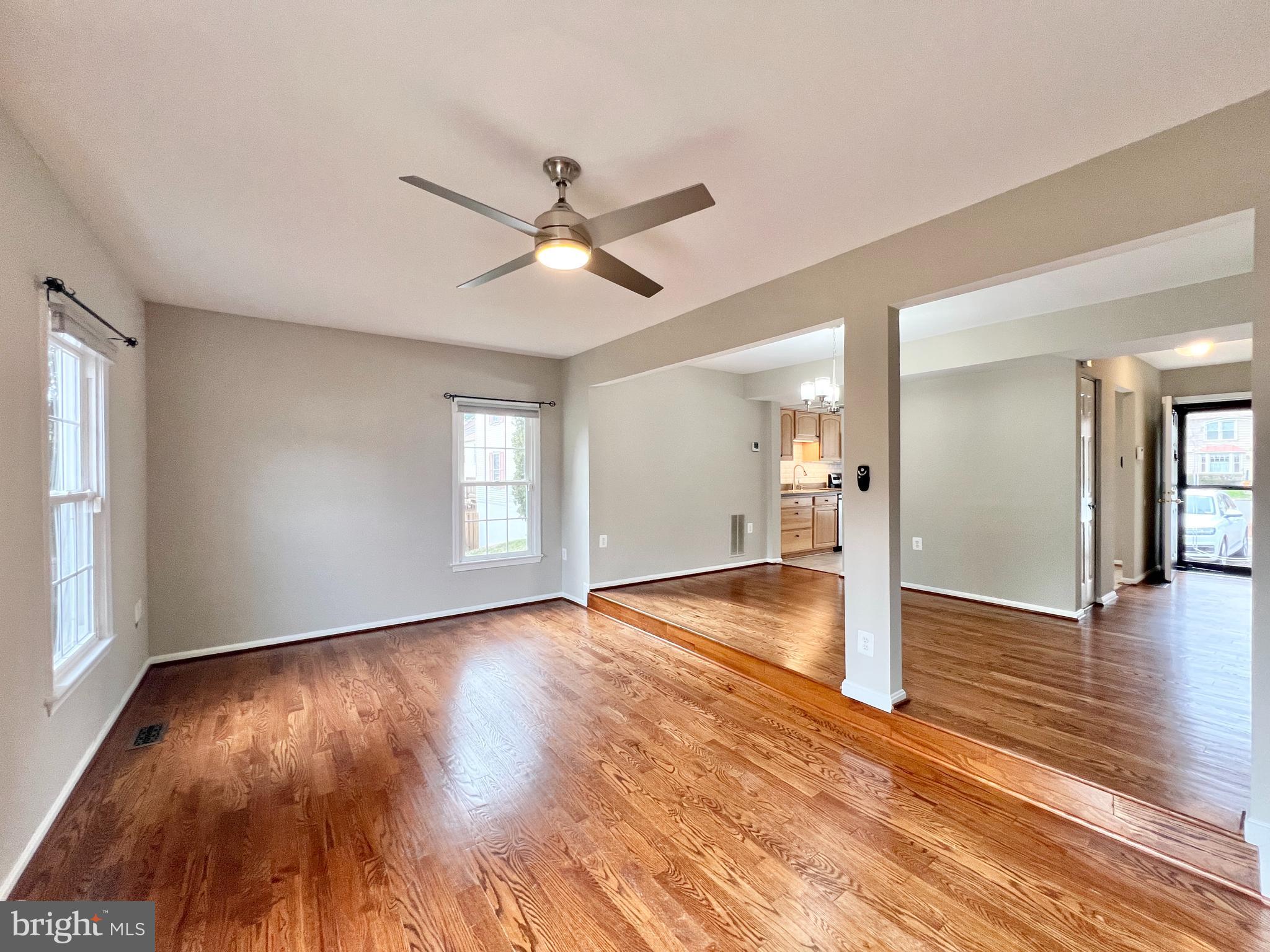 10287 Latney Road Fairfax, VA 22032 - Photo 7 of 26 a view of empty room with wooden floor and window