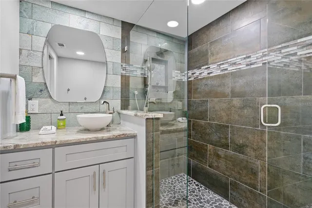 a view of a balcony with a potted plant