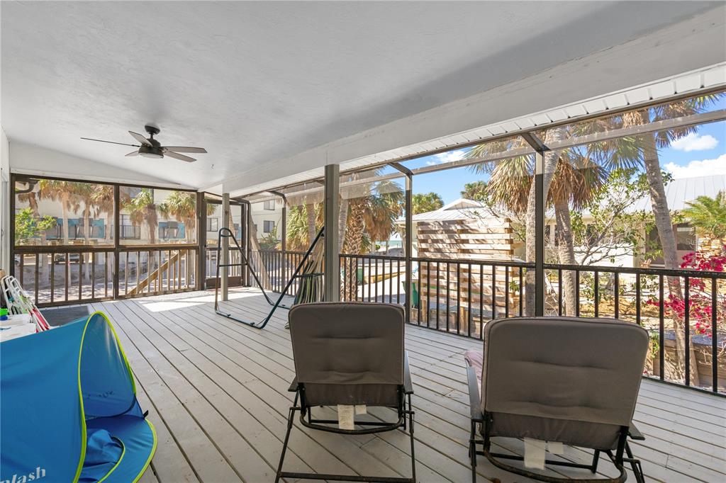 2476 North Beach Road Englewood, FL 34223 - Photo 44 of 58 a living room with furniture and a large window