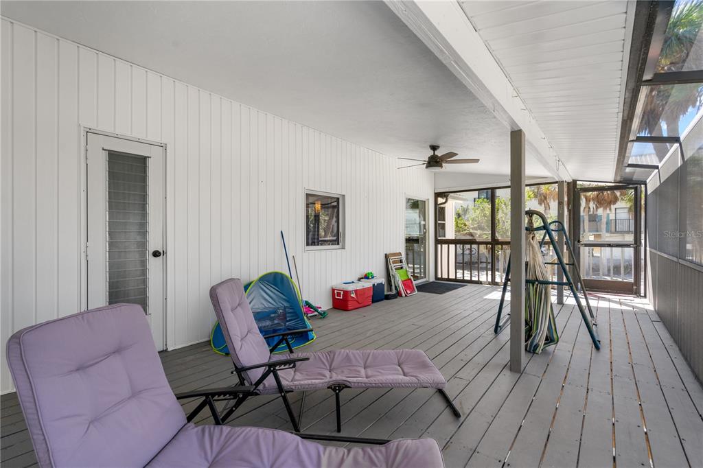 2476 North Beach Road Englewood, FL 34223 - Photo 46 of 58 a living room with furniture and wooden floor