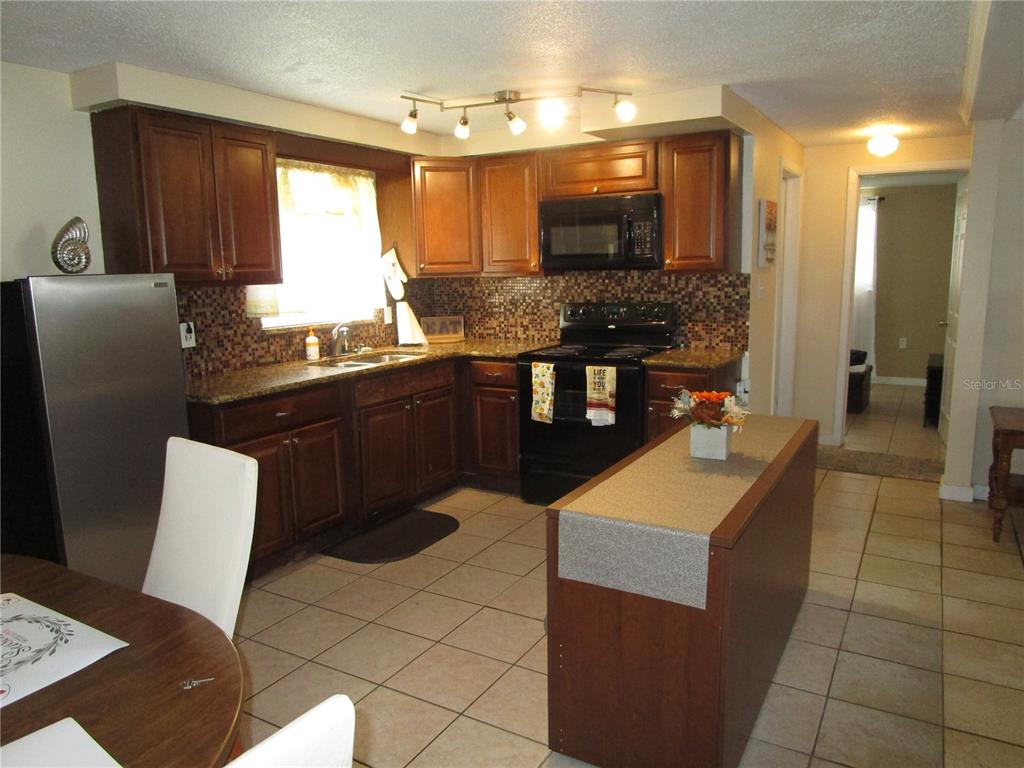10801 Fillmore Avenue Port Richey, FL 34668 - Photo 6 of 42 Gallery Image 6