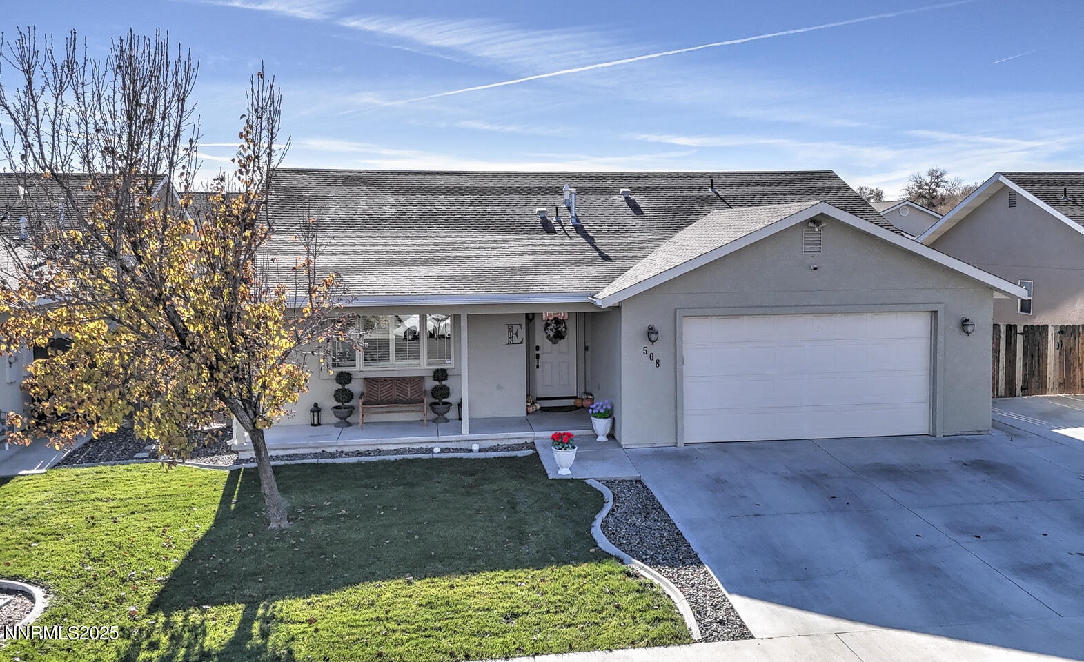 508 Cicada Street Fallon, NV 89406 - Photo 1 of 26 a front view of a house with garden