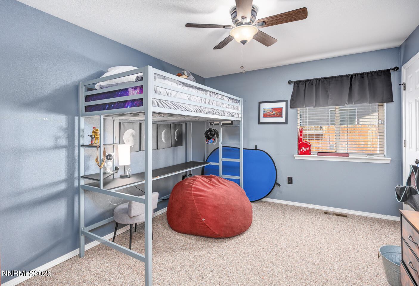 508 Cicada Street Fallon, NV 89406 - Photo 11 of 26 a room with furniture and a chandelier