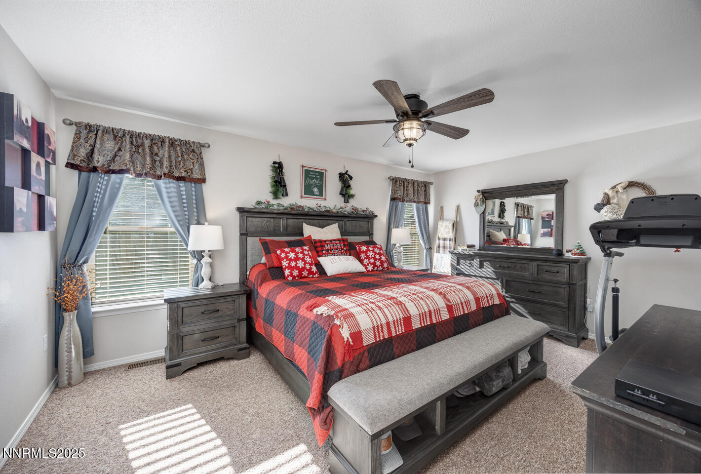 508 Cicada Street Fallon, NV 89406 - Photo 12 of 26 a bedroom with a bed and wooden floor