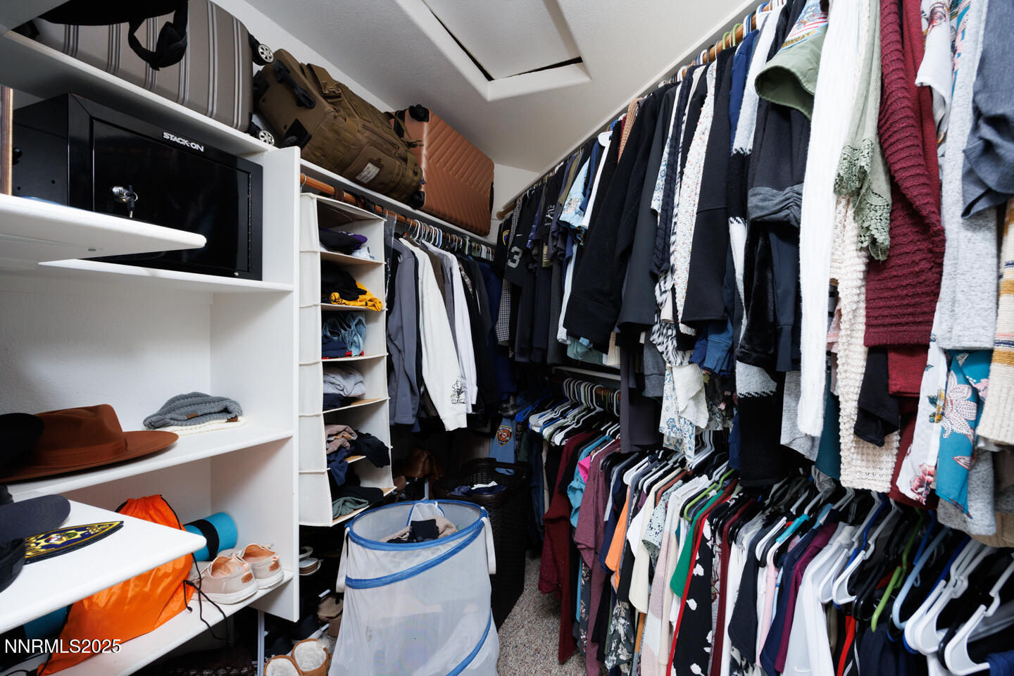 508 Cicada Street Fallon, NV 89406 - Photo 16 of 26 a view of walk in closet with clothes and shoes