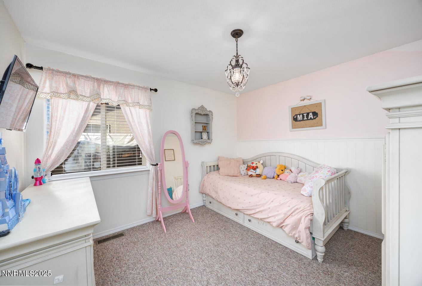 508 Cicada Street Fallon, NV 89406 - Photo 9 of 26 a bedroom with a bed and a table in it