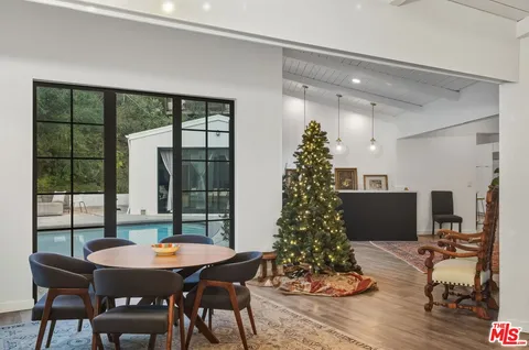 a living room with fireplace furniture and a fireplace
