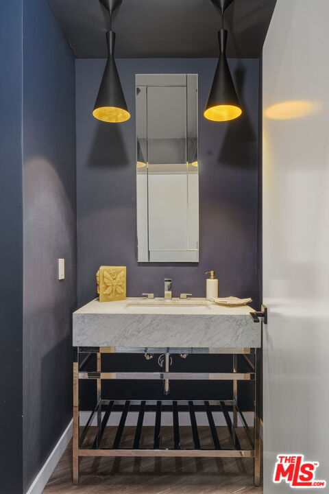 13019 Sky Valley Road Los Angeles, CA 90049 - Photo 22 of 39 a view of a dining room with chairs
