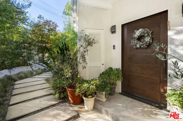 a view of a entryway door front of house