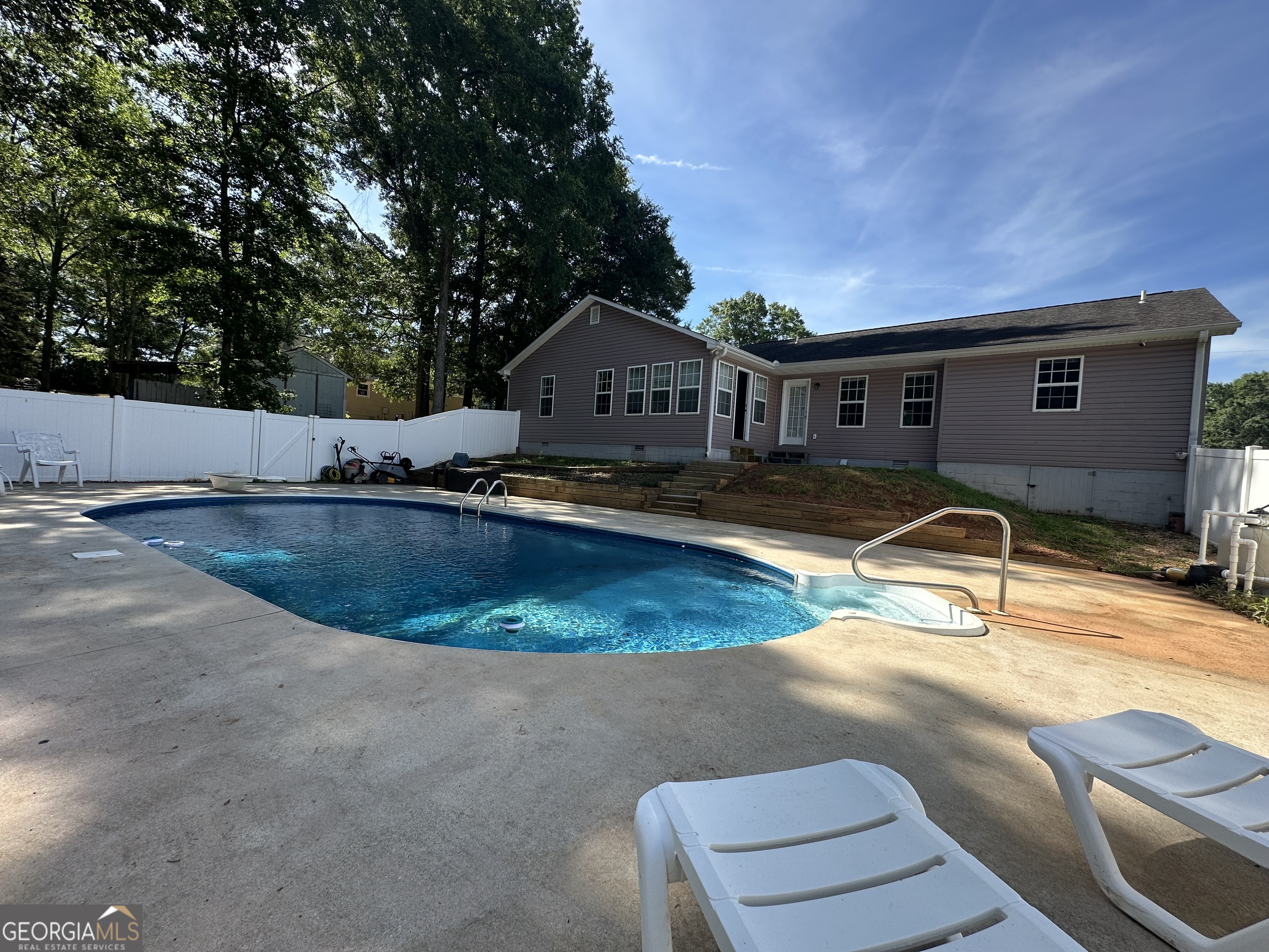 384 Sam Brown Boulevard Commerce, GA 30529 - Photo 18 of 25 a view of a house with pool