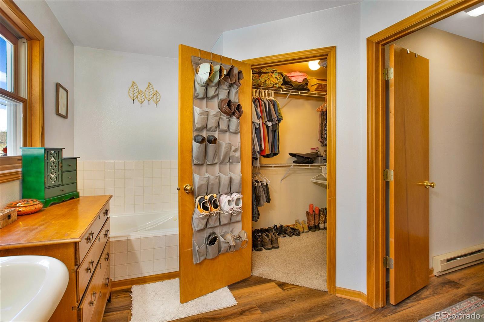757 Thompson Park Road Fairplay, CO 80440 - Photo 13 of 49 a view of a bathroom with a tub and shower