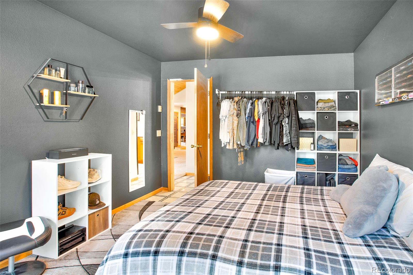 757 Thompson Park Road Fairplay, CO 80440 - Photo 22 of 49 a bedroom with a bed and window