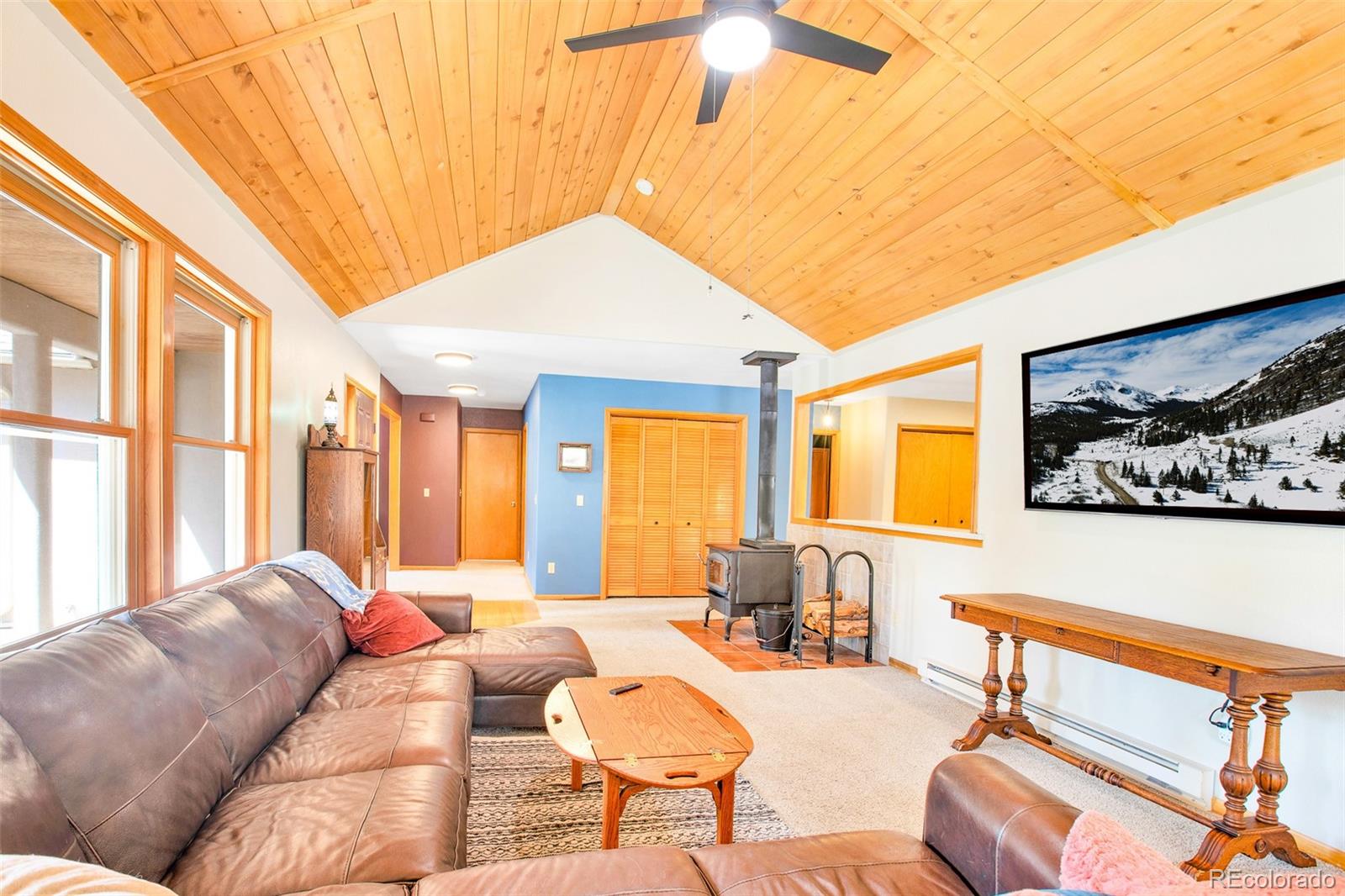 757 Thompson Park Road Fairplay, CO 80440 - Photo 3 of 49 a living room with furniture and a large window