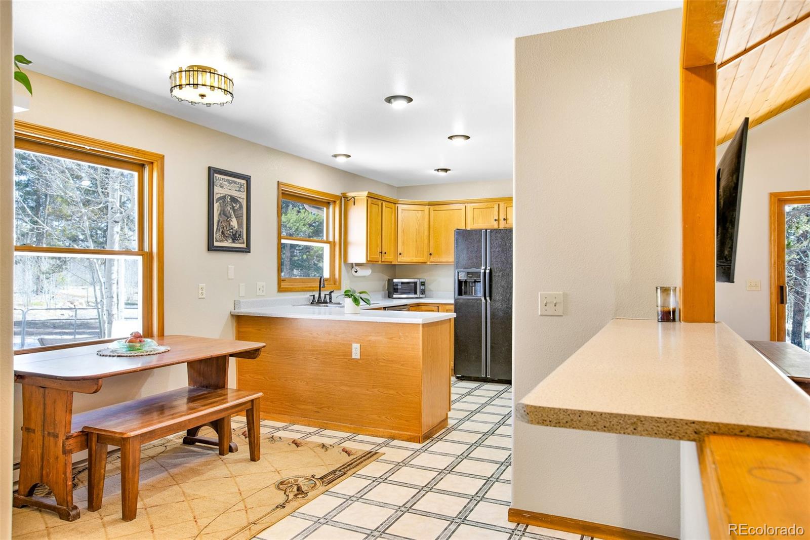 757 Thompson Park Road Fairplay, CO 80440 - Photo 5 of 49 a very nice looking dining room with a large window
