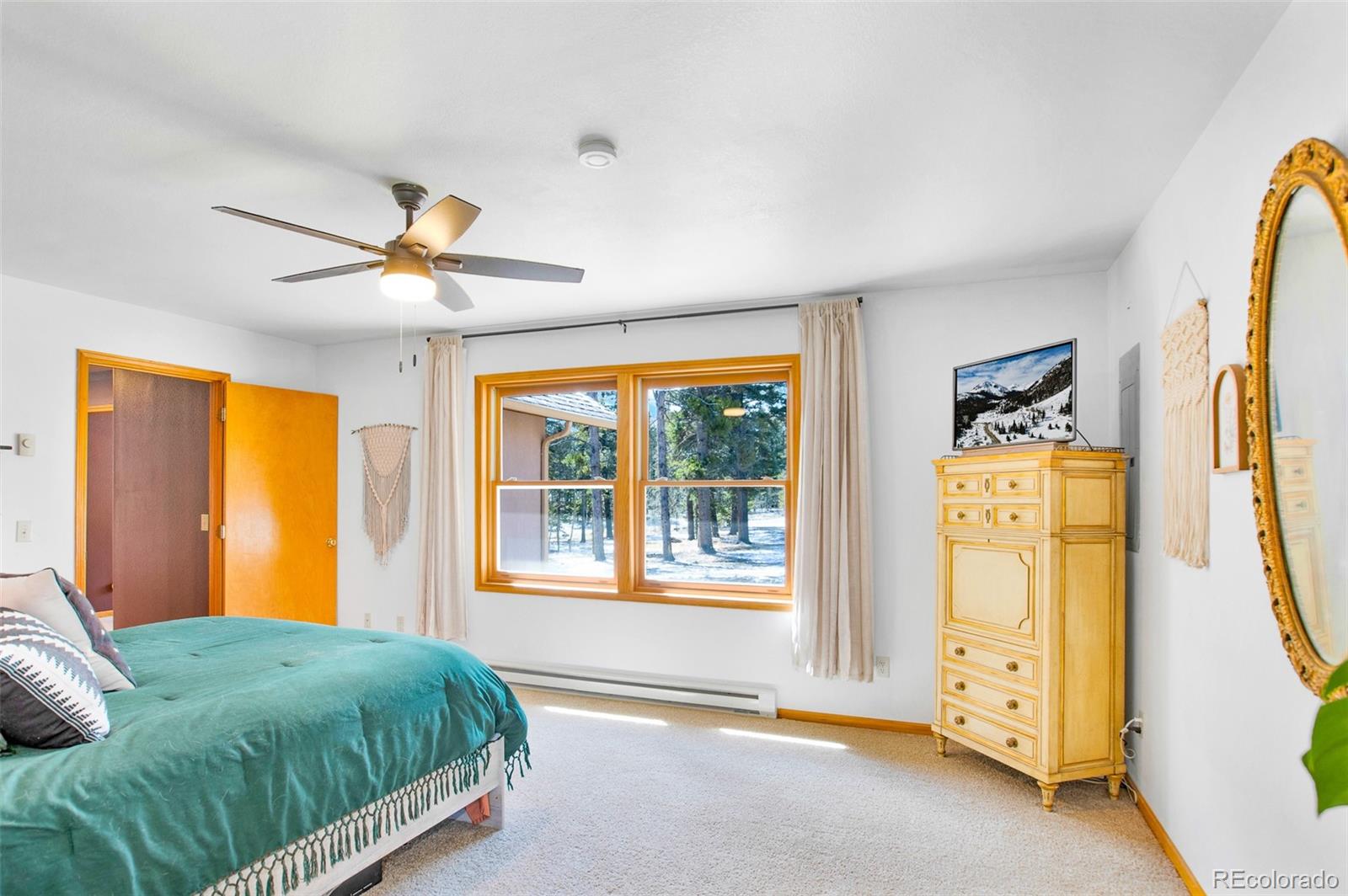 757 Thompson Park Road Fairplay, CO 80440 - Photo 10 of 49 a bedroom with a bed and a window