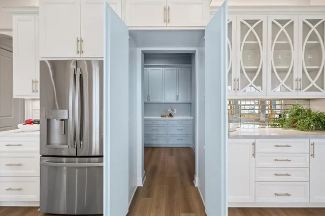 a view of kitchen with wooden floor