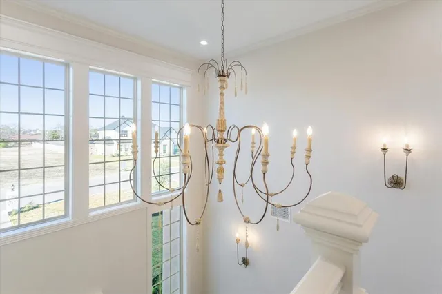 a room with gym equipment and windows