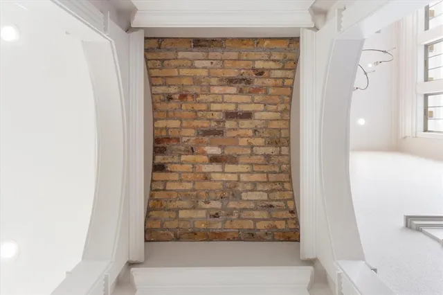 a bathroom with a shower and a sink