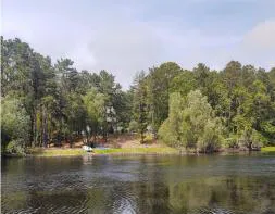 a view of a lake with a city