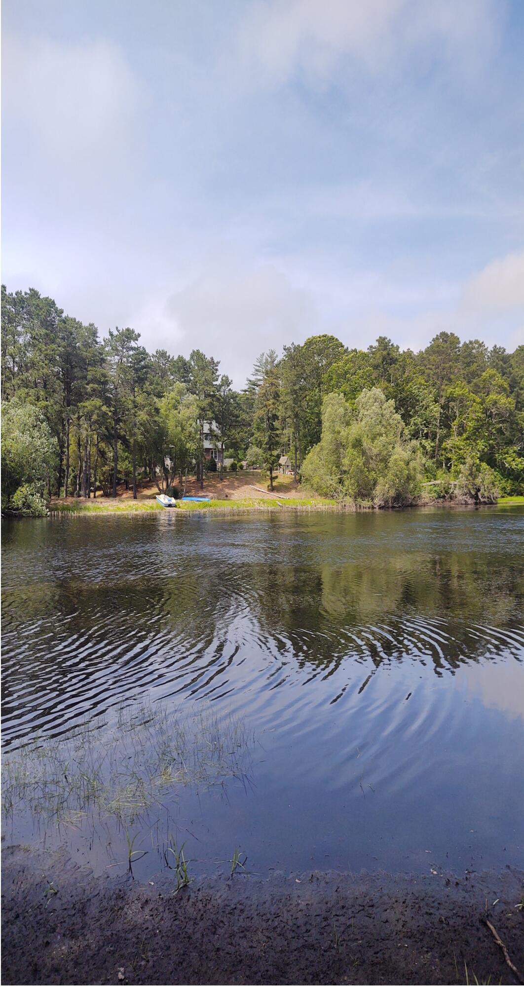10 Middle Road Harwich, MA 02645 - Photo 2 of 9 a view of a lake with a city