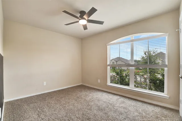 an empty room with a large window