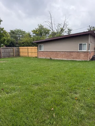 a view of outdoor space and yard