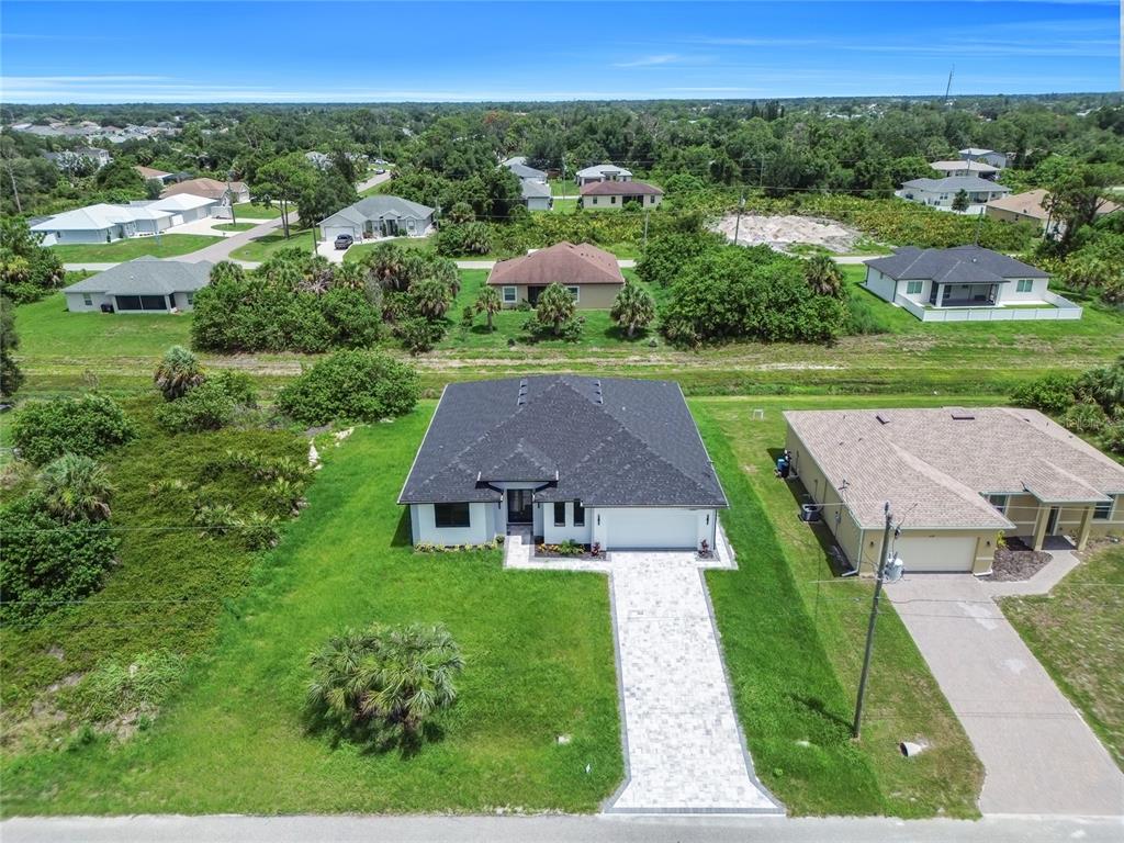 2328 Irondale Road North Port, FL 34287 - Photo 40 of 45 an aerial view of a house with yard