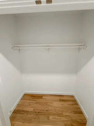 a view of small space with racks on the wall