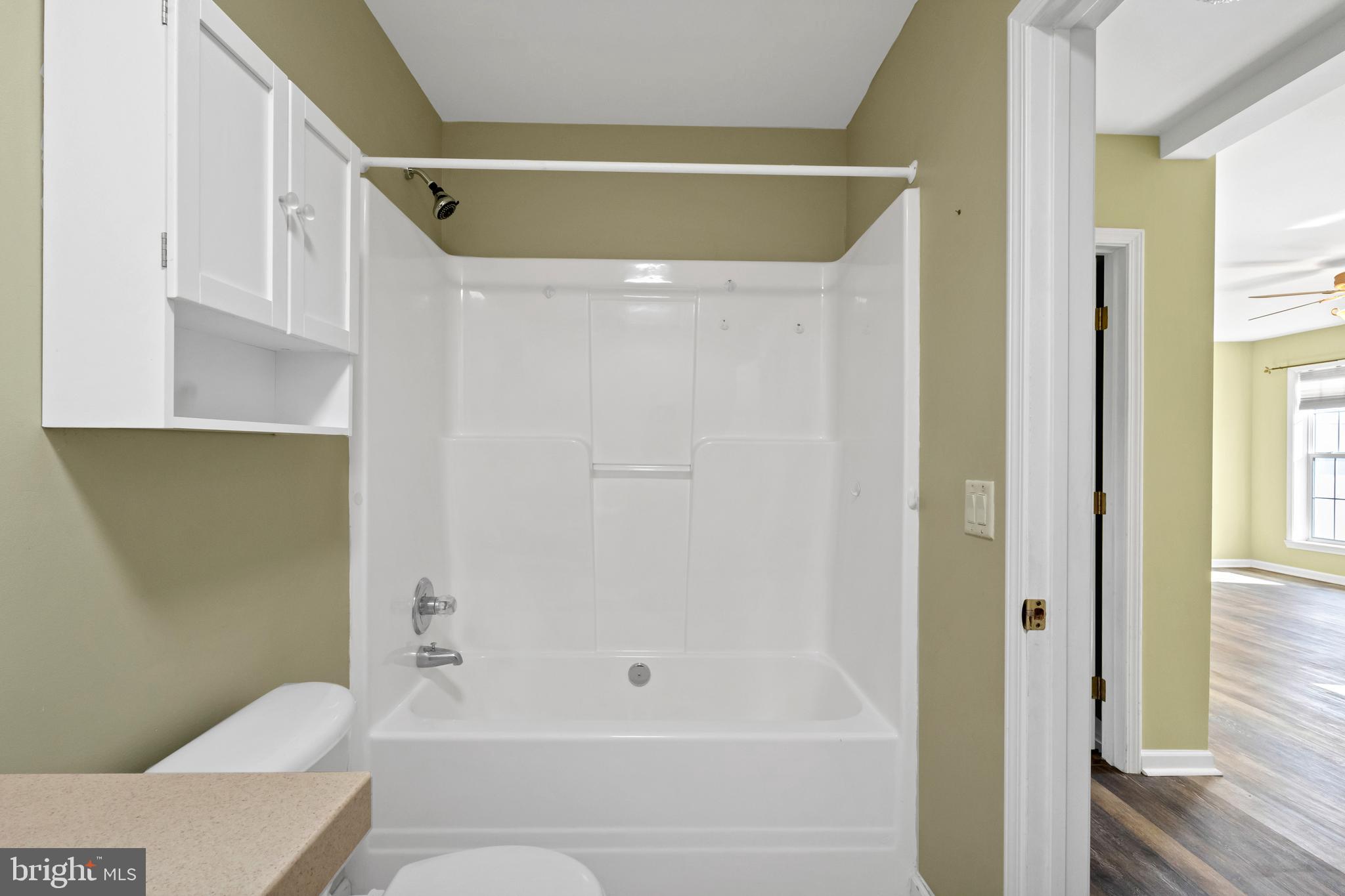 32530 Approach Way, Unit 3252 Millsboro, DE 19966 - Photo 28 of 54 a bathroom with a shower and a toilet