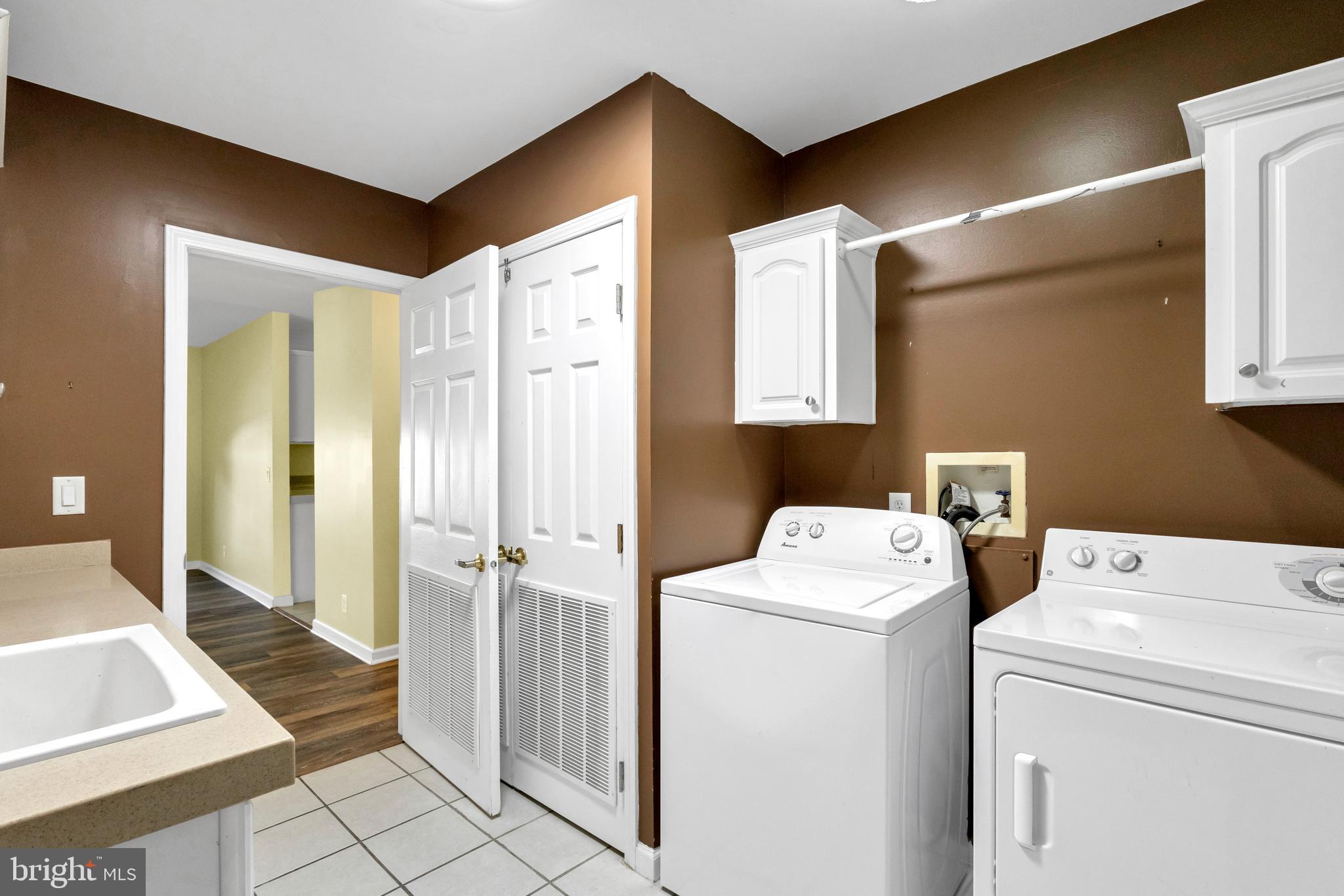 32530 Approach Way, Unit 3252 Millsboro, DE 19966 - Photo 34 of 54 a utility room with dryer and washer