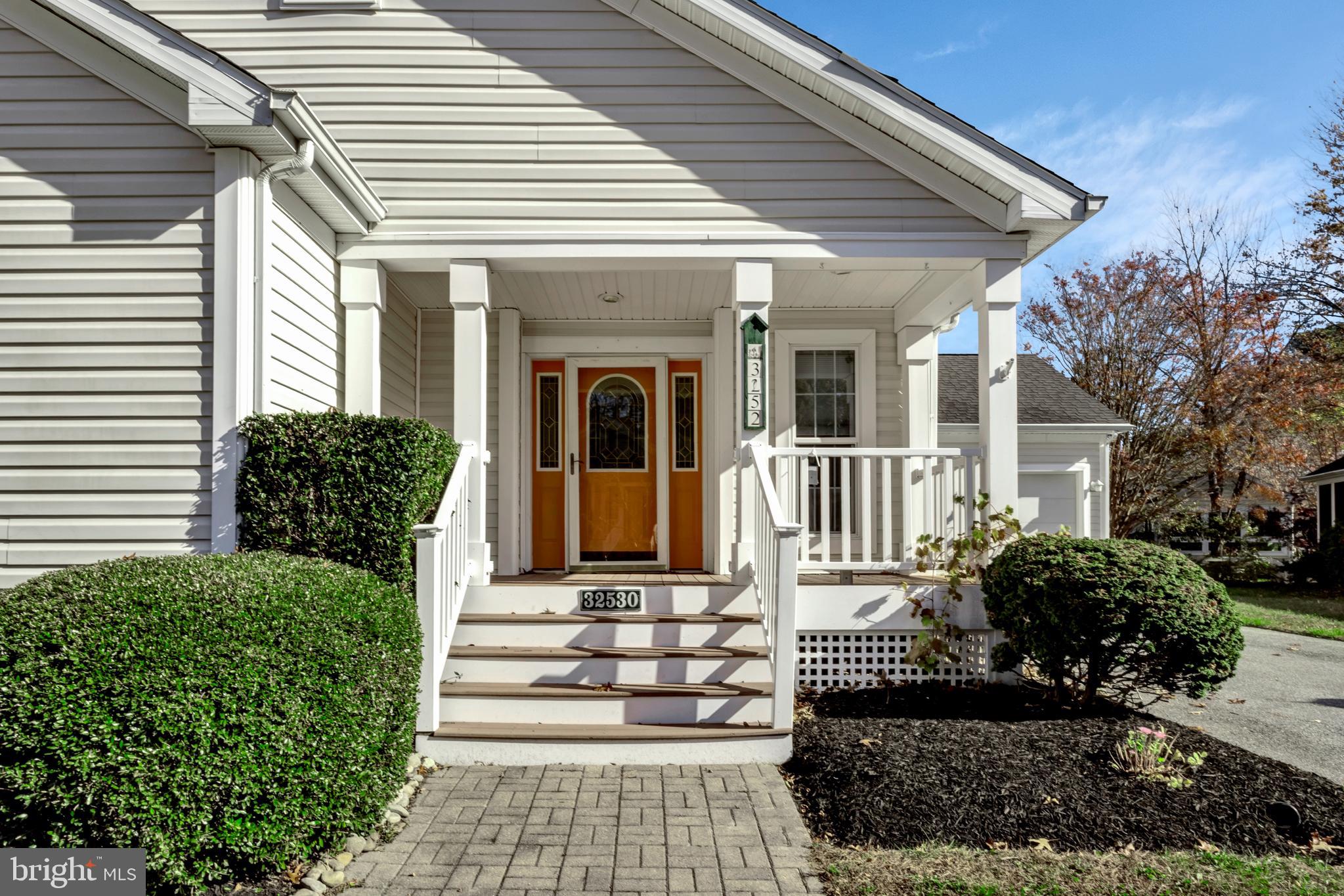 32530 Approach Way, Unit 3252 Millsboro, DE 19966 - Photo 36 of 54 a view of a house with a yard