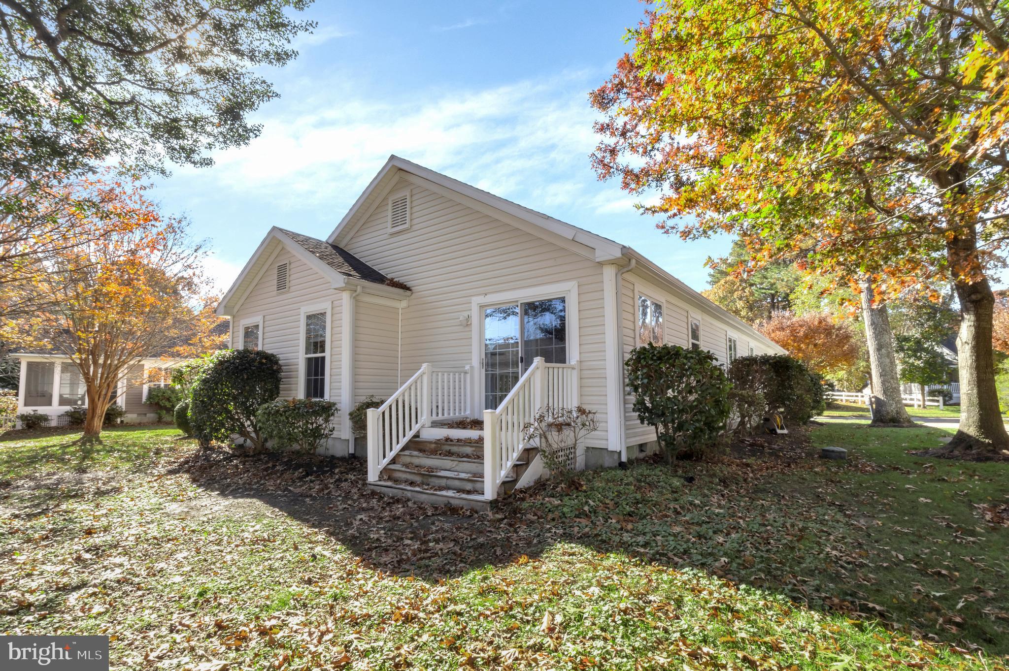 32530 Approach Way, Unit 3252 Millsboro, DE 19966 - Photo 39 of 54 a view of a house with backyard